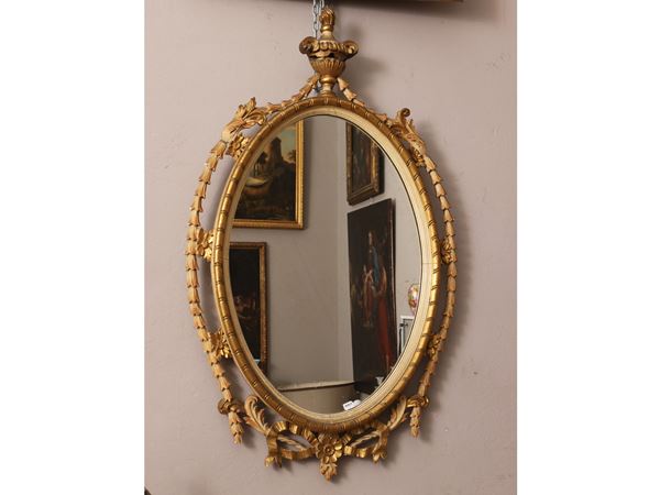 Mirror with carved and gilded wooden frame