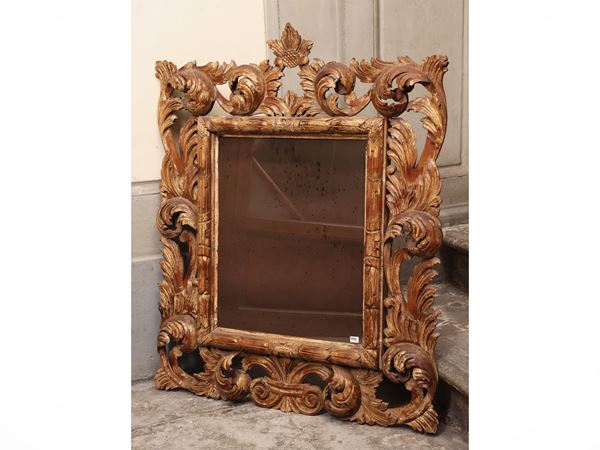 Mirror with carved and gilded wooden frame