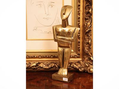 Figura in bronzo dorato, stile idoli dell’arte cicladica