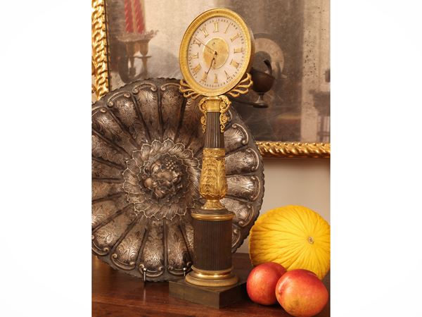 Nocturnal clock in gilded and patinated bronze and alabaster