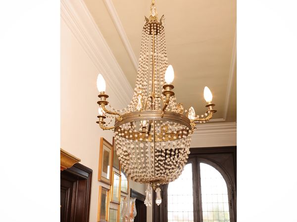 Pair of gilded bronze tundish lamps