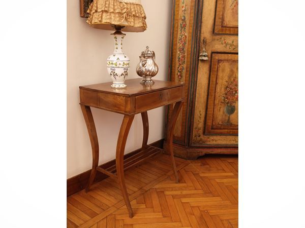 Side table in walnut with a light patina