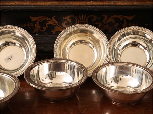 Dieci coppette lavadita in argento in stile Impero
