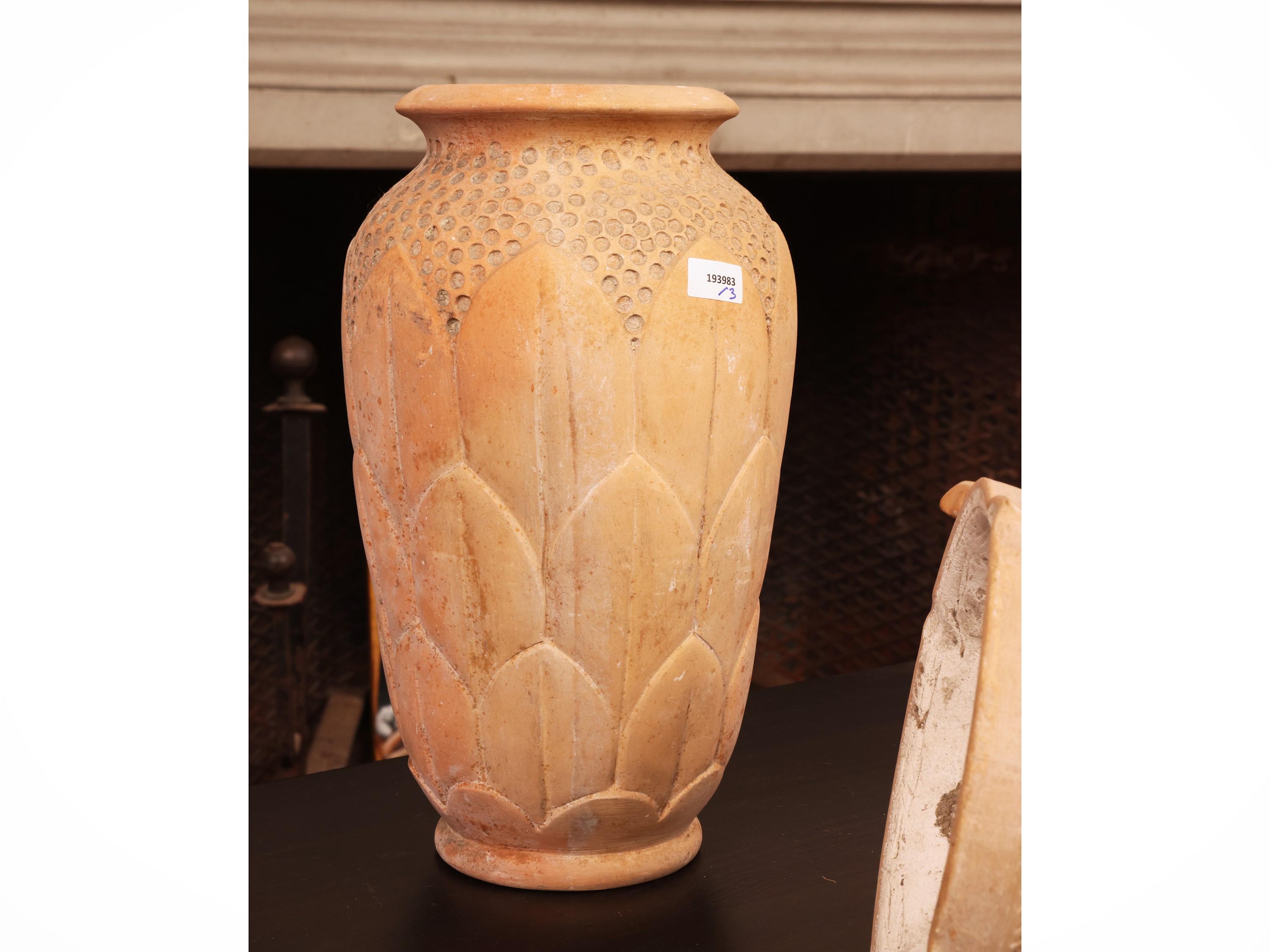 Tre vasi in terracotta, balaustro decorato, troncoconico e a coppa (prima metà del XX secolo)