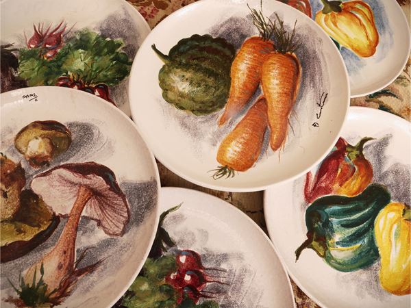 Serie di sei sottopiatti in ceramica
