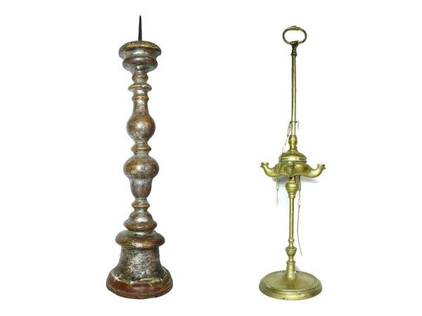 Silvered Wooden Pricket, Tuscan, first half of 18th Century and a Brass Oil Lamp, 19th Century