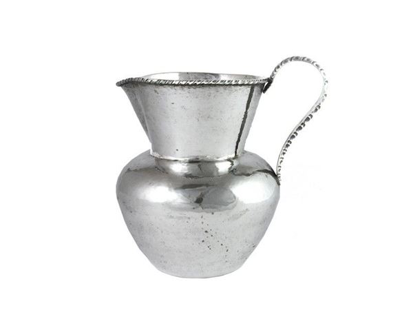 Caraffa in argento martellato