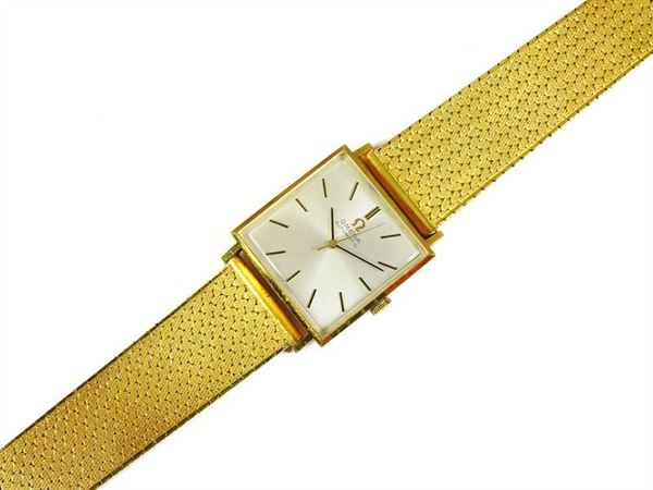 Automatic gentleman's wristwatch, yellow gold case and bracelet, white dial