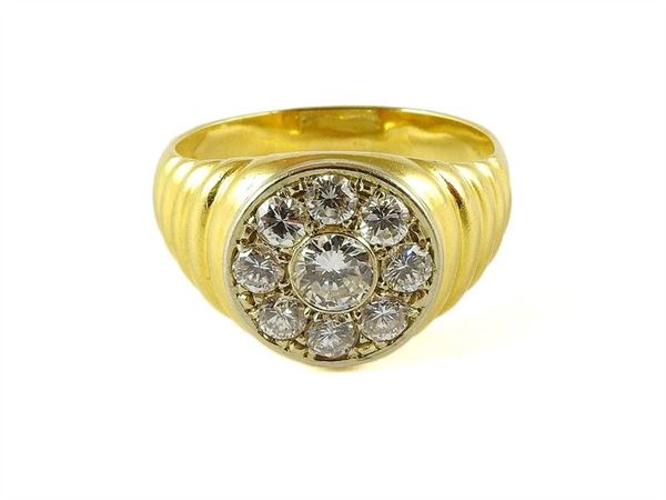 Yellow gold flower shaped ring with diamonds