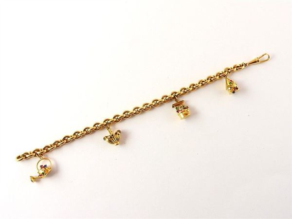 Yellow gold bracelet with rural-subject charms and color stones