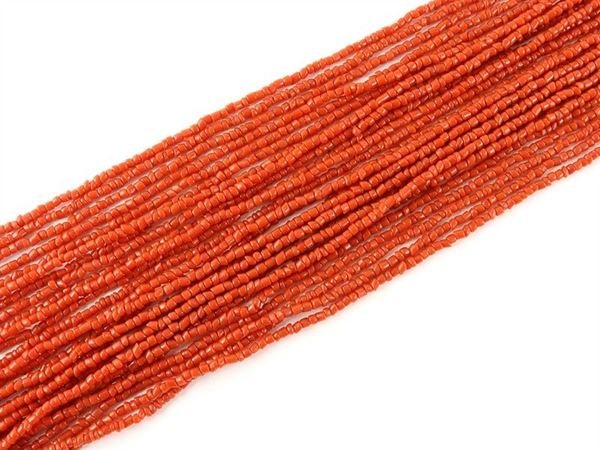 Bunch of twentyseven small red coral cylinderlike strands