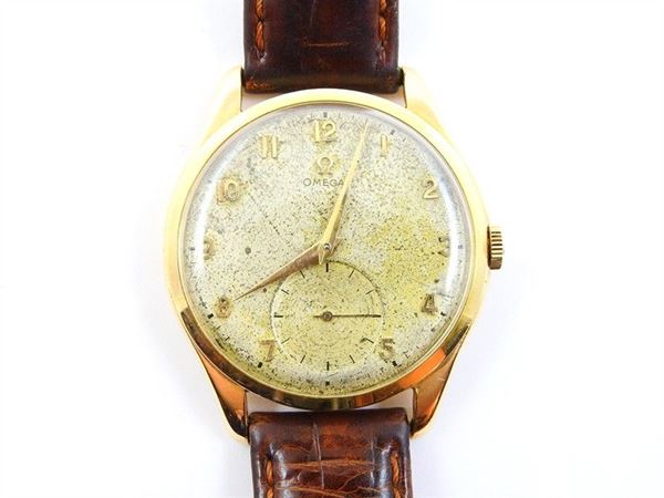 Omega manual yellow gold gentleman's wristwatch