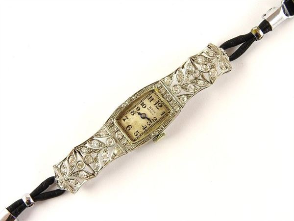 B&M, Baume & Mercier, GenÃ¨ve white gold lady's wristwatch with diamonds