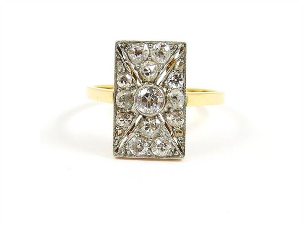 Yellow and white gold ring with diamonds