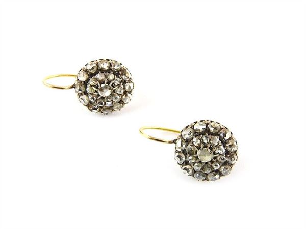 Yellow gold and silver earrings with rose cur diamonds