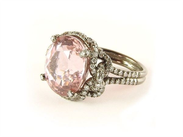 Dark gold ring with pink tourmaline and diamonds