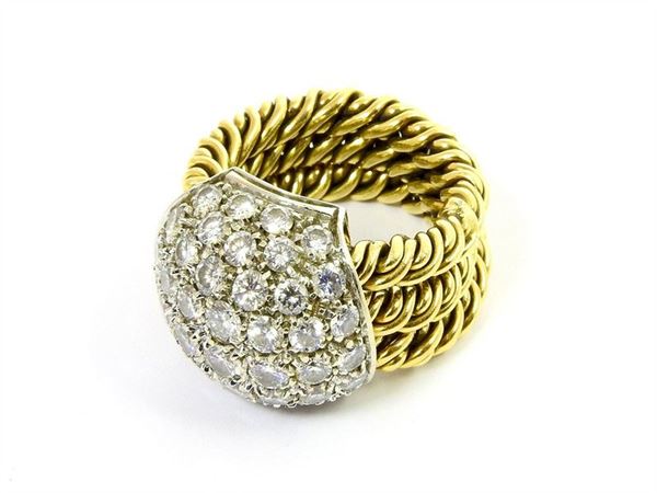 Pomellato yellow and white gold ring with round brilliant cut diamonds