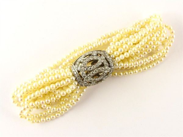 M Fontana twelve strands Akoya pearls bracelet with platinum and diamonds clasp