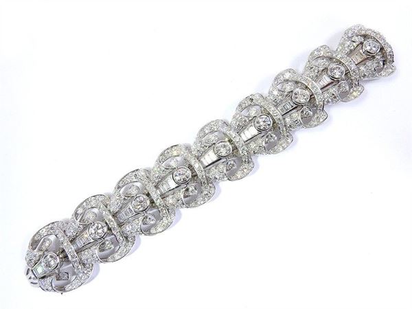Platinum paneled bracelet with diamonds