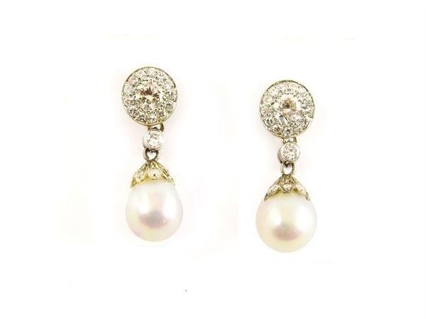 White gold ear pendants with diamonds and semi-baroque pearls