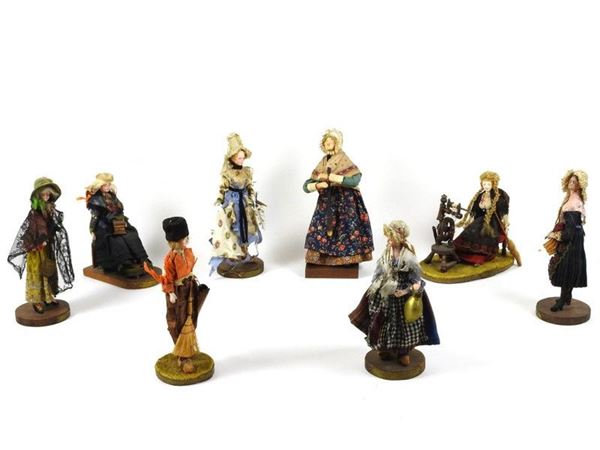 Eight Painted Plaster Figurines in Traditional North European Costumed