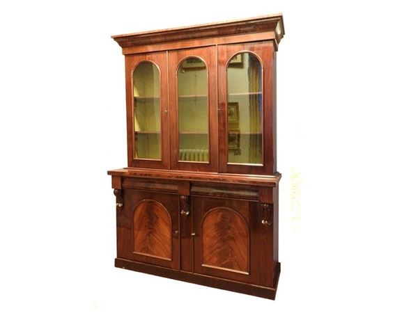 A Two Piece Mahogany Veneered Cabinet