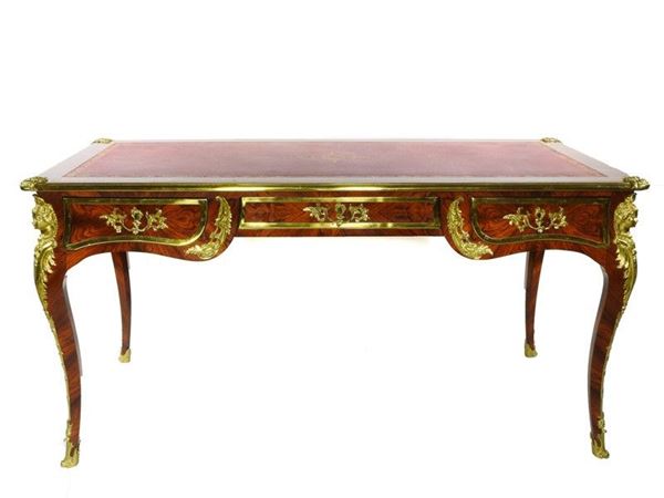 An 18th Century Style Rosewood Veneered and Gilded Bronze Desk Table