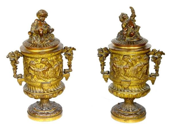 Pair of Gilded Metal Lidded Vases