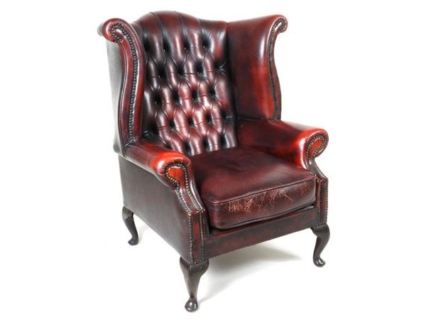 A Chesterfield Style Wing Armchair
