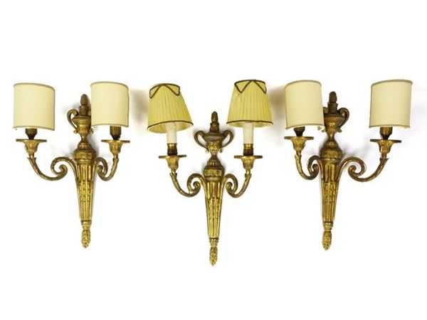 A Set of Three Gilded Bronze Wall Lamps