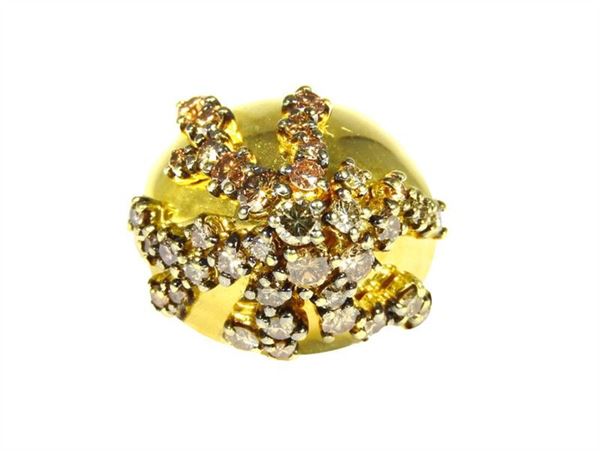 Yellow gold domed ring with fancy color diamonds