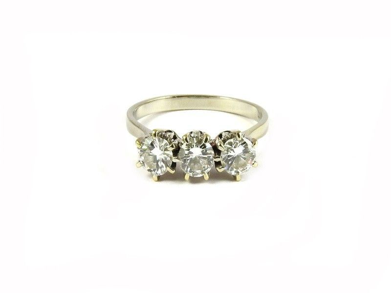 Anello Trilogy in Oro Bianco e Diamanti