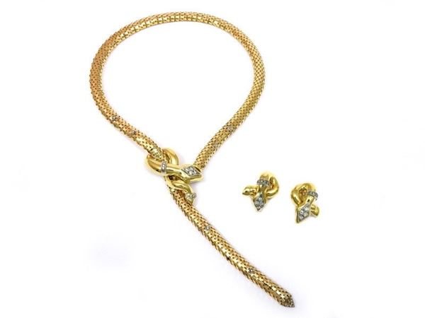 Yellow gold and diamonds snake shaped flexible necklace