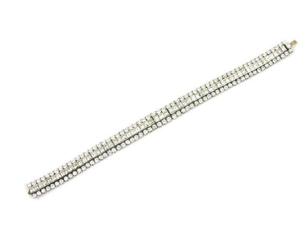 Platinum flexible woven bracelet with diamonds