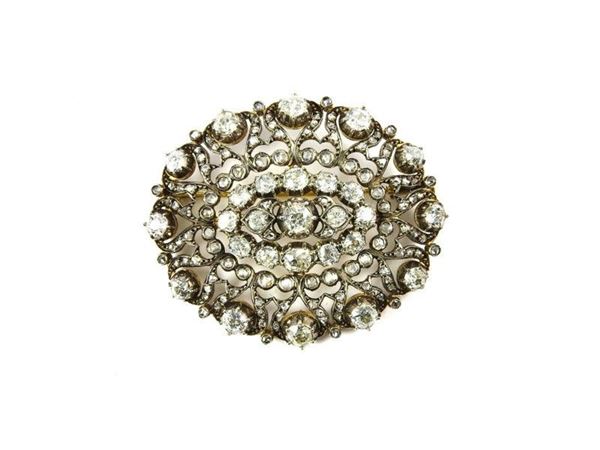 Yellow gold and silver old brooch with diamonds