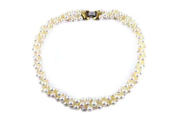 Three strands cultured pearls necklace