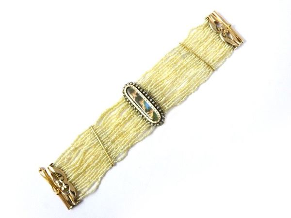 Twenty strands micro pearls bracelet