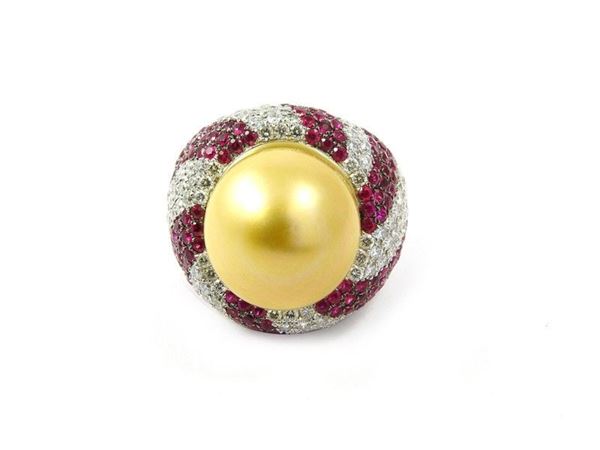 White gold ring set with diamonds, rubies and South Sea cultured pearl