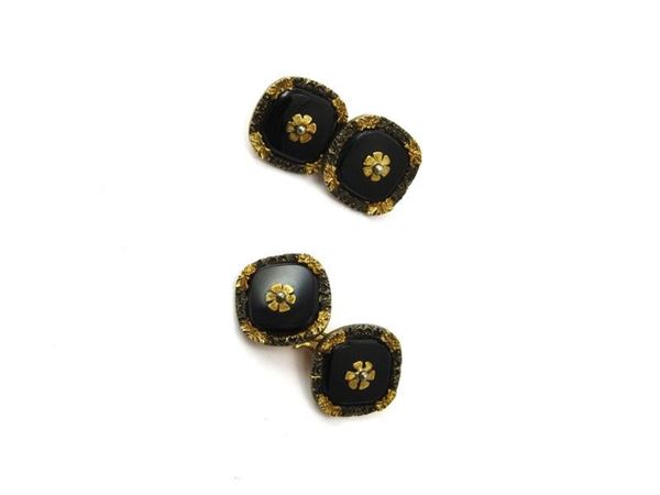 Yellow gold, silver and onyx Florentine style wrought cuff-links