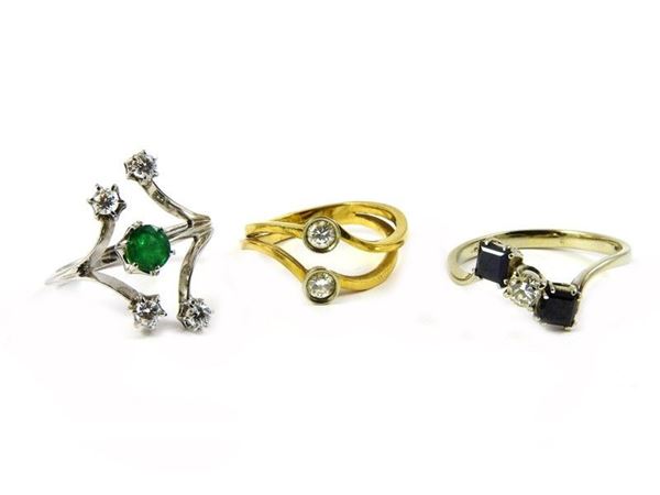 Lot of white gold ring with emerald and diamonds, white gold ring with sapphires and diamond, yellow gold croisÃ¨ ring with diamonds