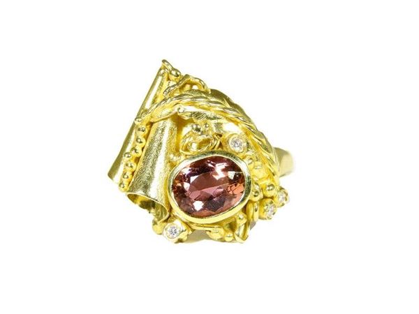 Yellow gold fancy ring with pink tourmaline and diamonds