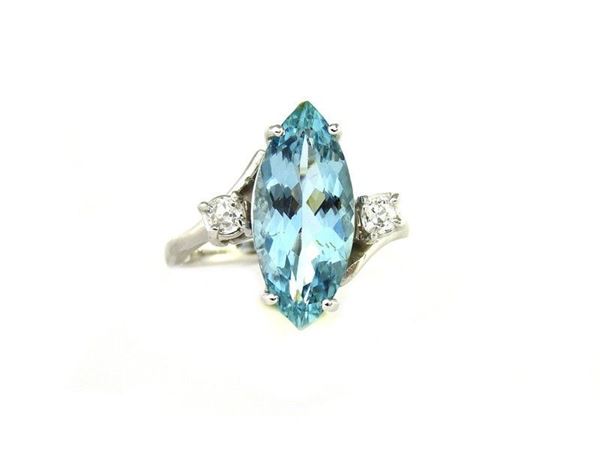 White gold ring with aquamarine and diamonds