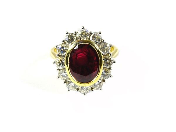 Yellow and white gold ring with ruby and diamonds