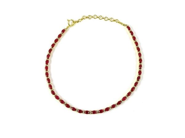 Yellow gold collier de chien with rubies and diamonds