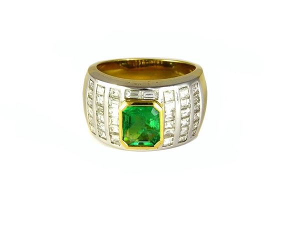 Yellow and white gold ring with emerald and diamonds