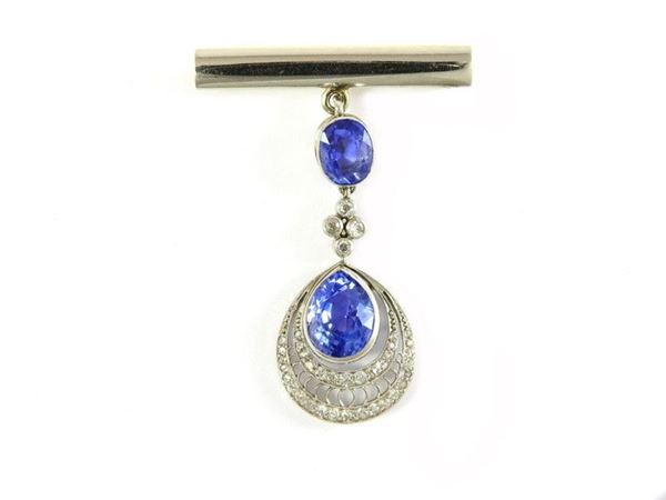 White gold brooch-pendant set with sapphires and diamonds