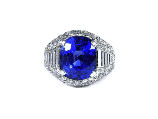 Platinum ring with unheated sapphire and diamonds