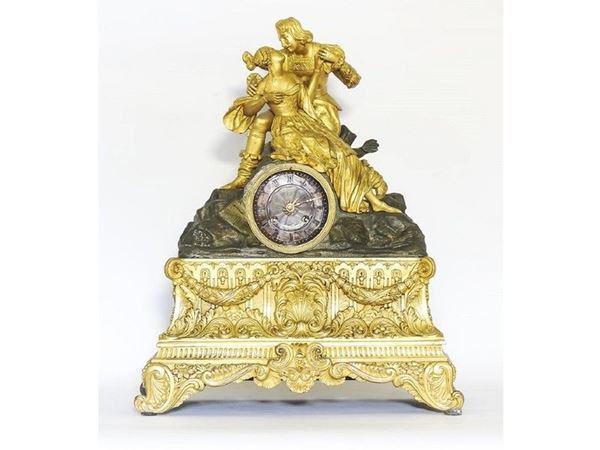 Orologio da tavolo in bronzo dorato e patinato