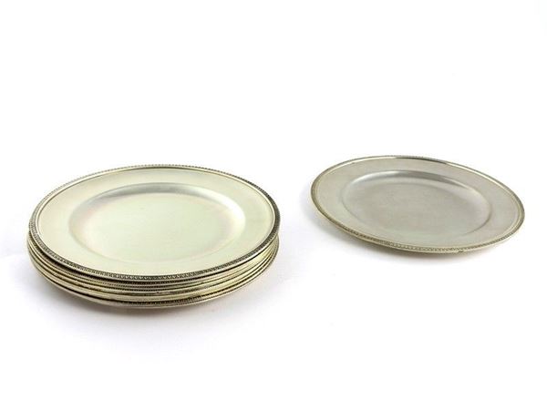 Serie di dodici piattini in argento