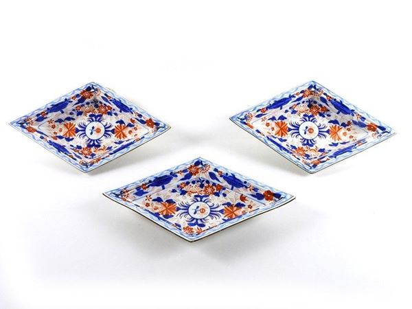A Set of Three Painted Pottery Rhomboidal Bowls